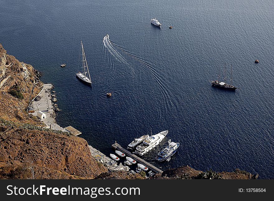 Sea and boats in Santorini, travel in Greece