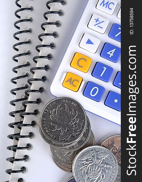 Document, calculator and coins