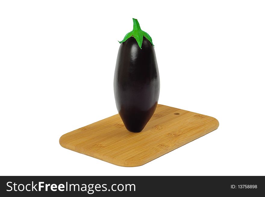 Eggplant On Wooden Board Isolated On White.