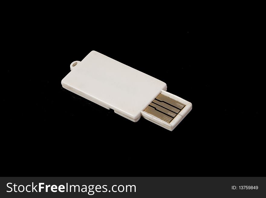 Unbranded blue-tooth dongle on black background