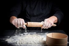 Wooden Rolling Pin In Men`s Hands Royalty Free Stock Image Wooden Rolling Pin In Men`s Hands Royalty Free Stock Image