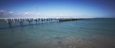Long Pier Stretching Into The Sea Royalty Free Stock Photo