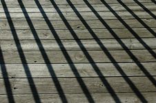 Shadows On Wood Floor Royalty Free Stock Image