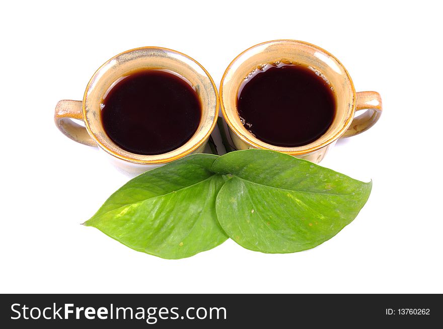 Two cup of black tea isolated on white background.