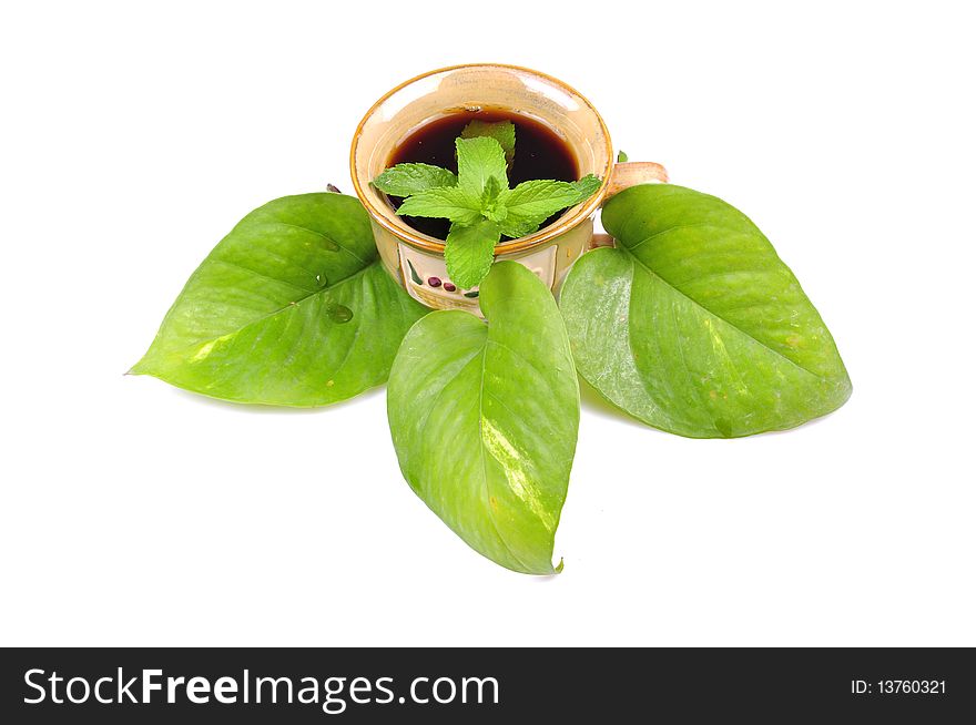 Herbal mint tea cup isolated ovver white background.