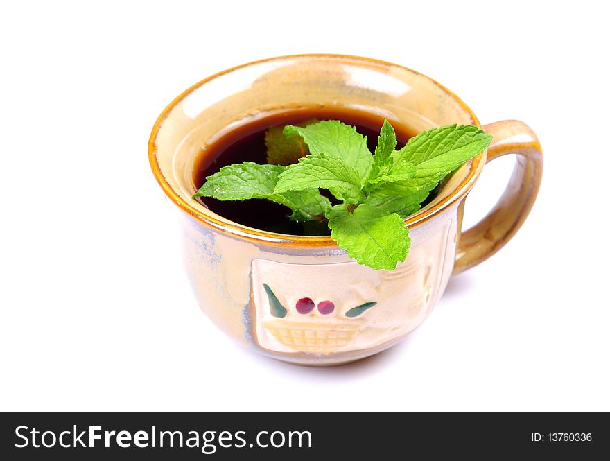 Mint tea cup isolated on white background.