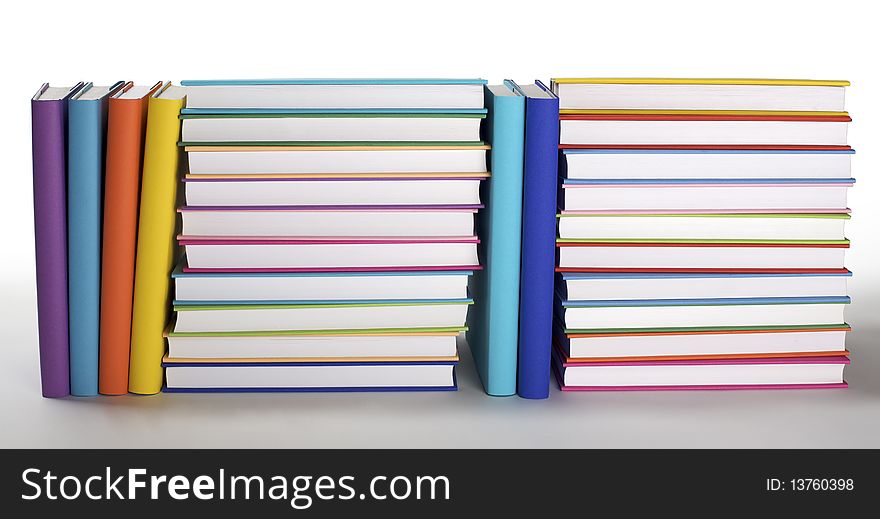 Arrangement of colorful books with blank covers on white background,  PHOTOGRAPH, NOT 3D RENDER. Arrangement of colorful books with blank covers on white background,  PHOTOGRAPH, NOT 3D RENDER.