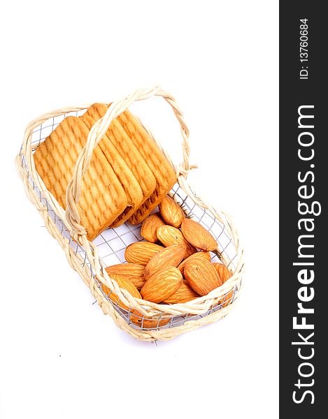 Almonds and biscuits isolated on white background.