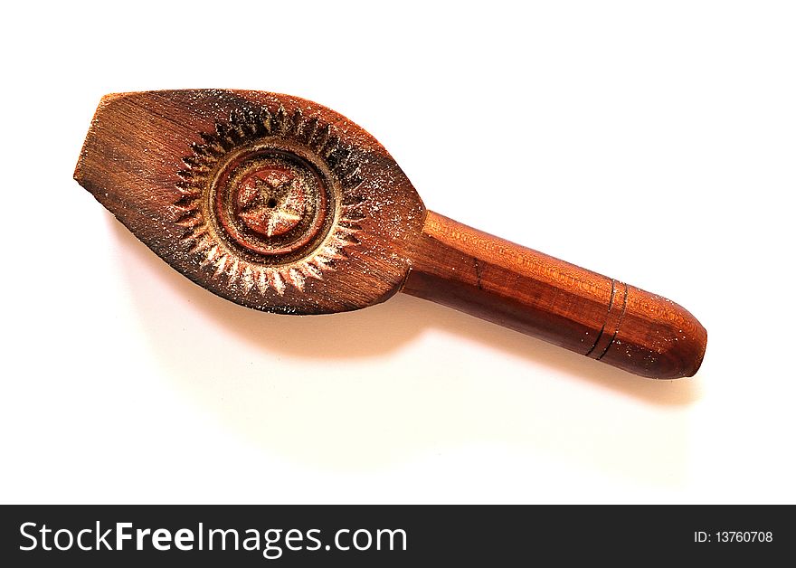 Wooden spoon carved from the inside with different textures aimed for identifying with maamool cookie is either pistachio, walnut or date. Wooden spoon carved from the inside with different textures aimed for identifying with maamool cookie is either pistachio, walnut or date