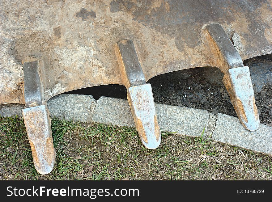 Three backets teeth of an excavator