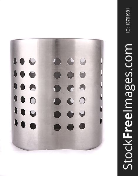 A stainless steel cylinder shaped cutlery holder