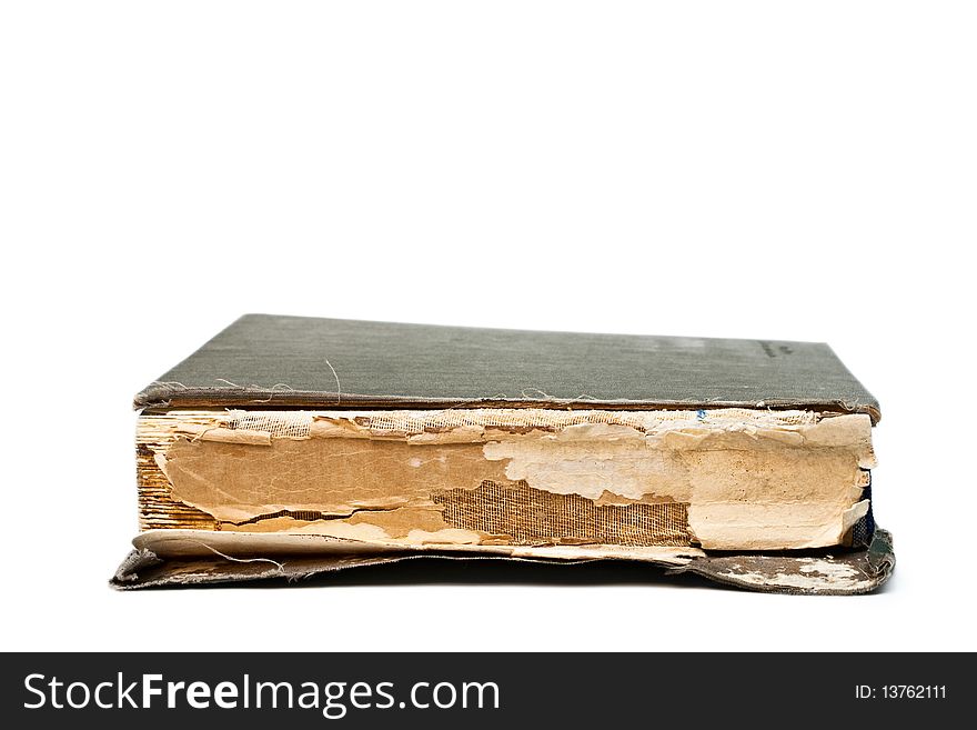 Detail of an old book isolated on white.