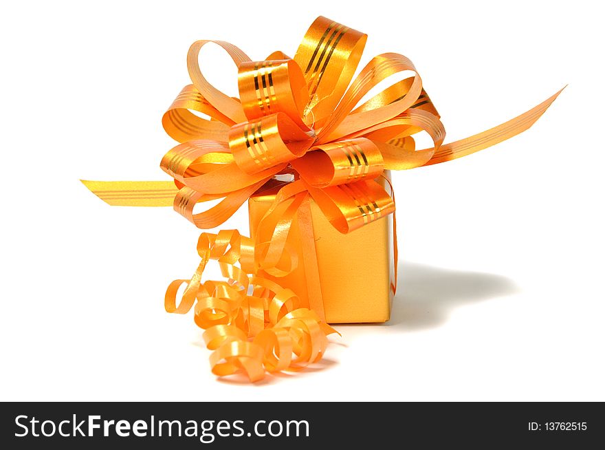 Golden gift isolated on white background