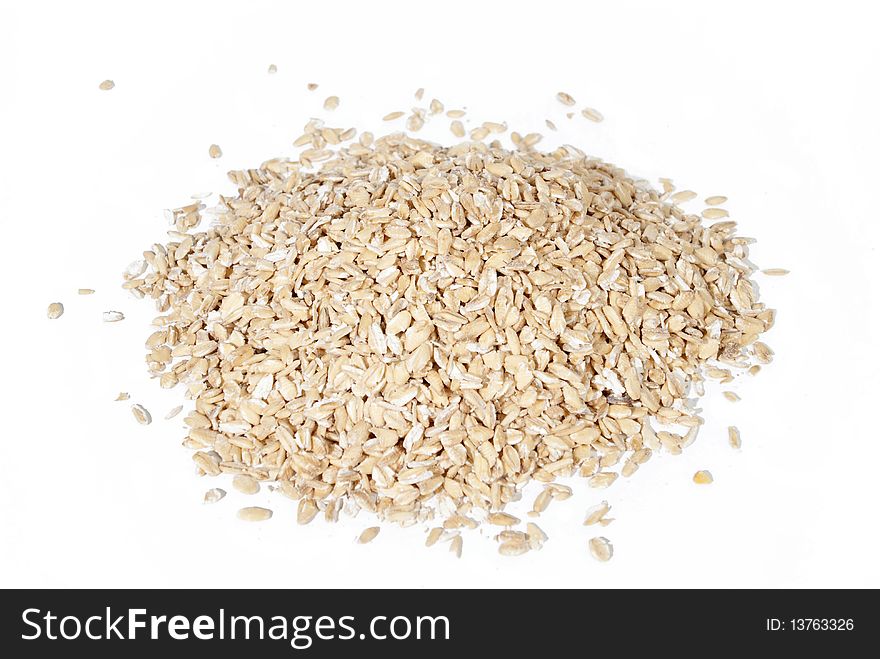 Poured oatmeal on white background