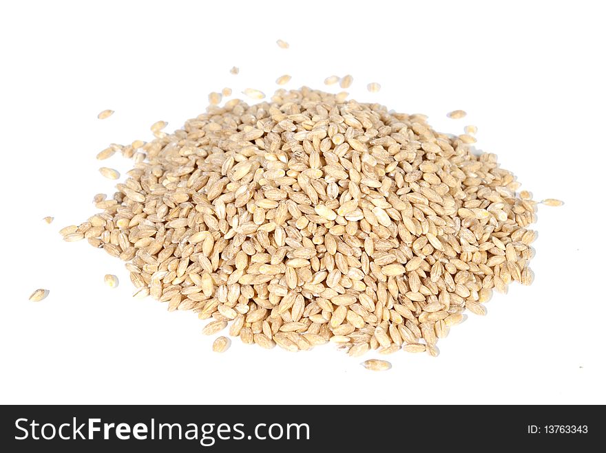 Poured wheat on white background