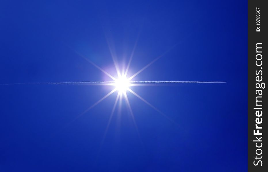 Airplane flying through the sun. Airplane flying through the sun