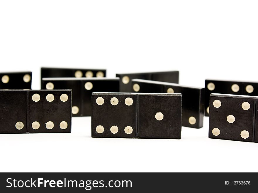 Black dominoes with white dots.