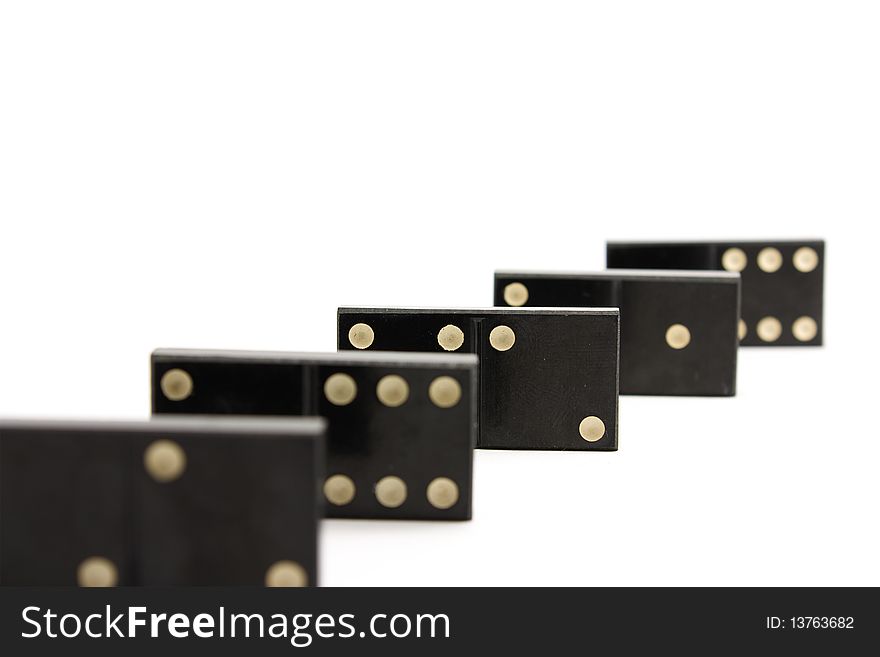 Black dominoes with white dots.