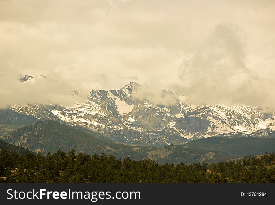 Foggy Mountain with clouds in background