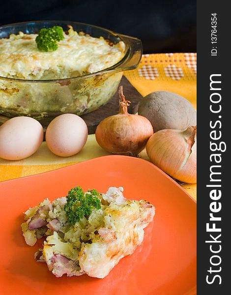 Baked potatoes with cheese and onions