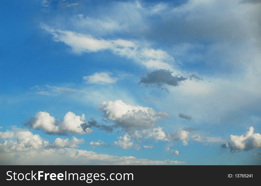 Beautiful summer sky with gray and white clouds