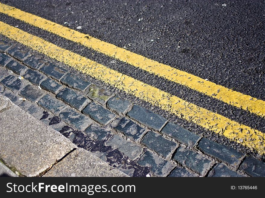 double yellow lines on a road signalling no parking