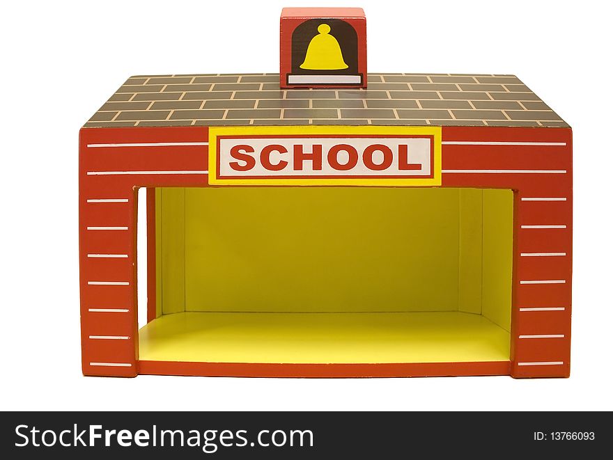 Toy red and yellow wooden schoolhouse. Toy red and yellow wooden schoolhouse