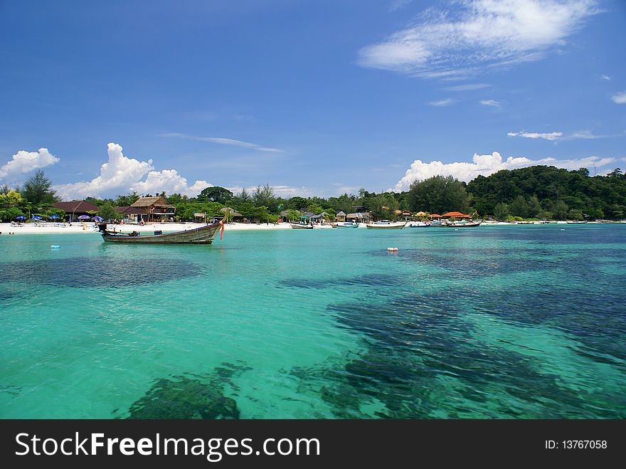 This is a picture of the boat on the beach in thailand. This is a picture of the boat on the beach in thailand