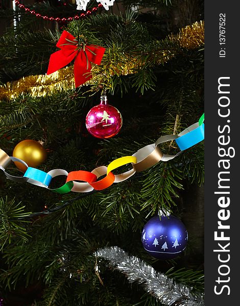 Colorful, traditional Christmas decorations on the Christmas tree