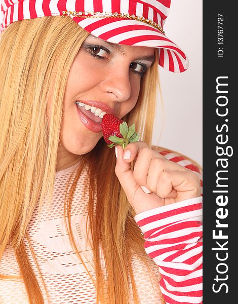 Beautiful Woman Eating Strawberry