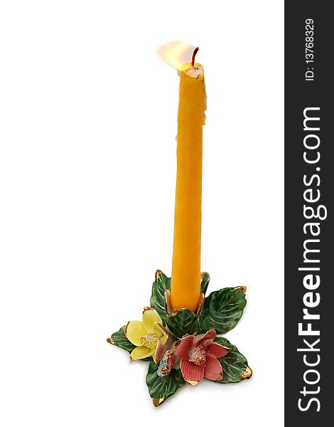 Burning Candle In Candlestick