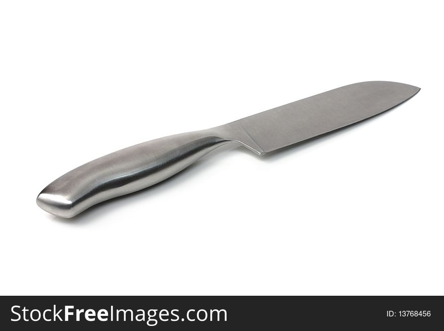Large metallic knife on a white background