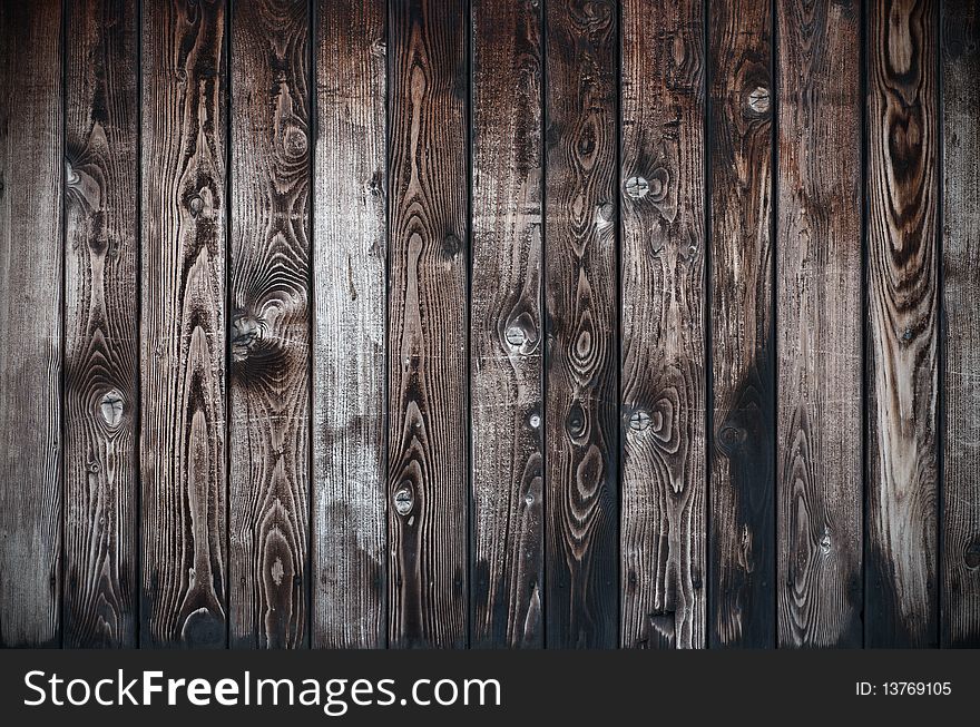 Weathered wooden background with vertical planks. Weathered wooden background with vertical planks.