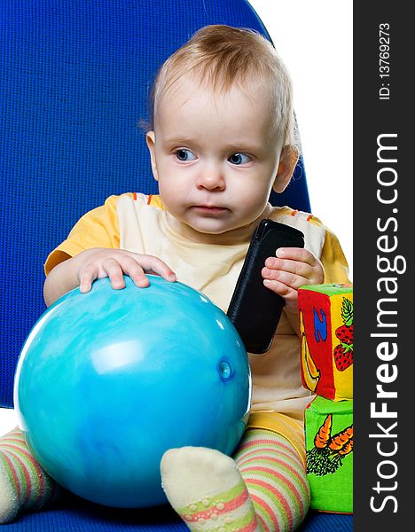 Little boy with a ball on white background