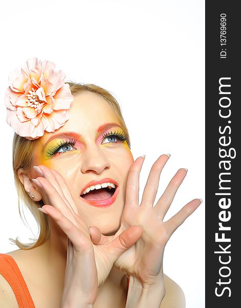 Concept of summer fashion woman with creative eye make-up in yellow and green tones screaming. copy-space. Concept of summer fashion woman with creative eye make-up in yellow and green tones screaming. copy-space