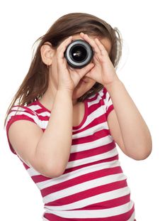 Young Girl Looking Through A Camera Lens Royalty Free Stock Photography Young Girl Looking Through A Camera Lens Royalty Free Stock Photography