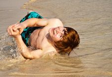 Happy Boy With Red Hair Is Enjoying The Beach Royalty Free Stock Image Happy Boy With Red Hair Is Enjoying The Beach Royalty Free Stock Image