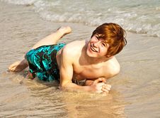 Happy Boy Is Lying At The Beach And Enjoying Stock Image Happy Boy Is Lying At The Beach And Enjoying Stock Image