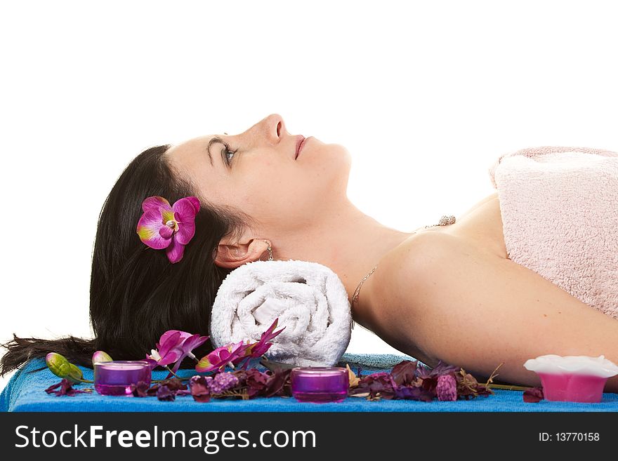 Beautiful woman with flower in her hairs at spa. Beautiful woman with flower in her hairs at spa