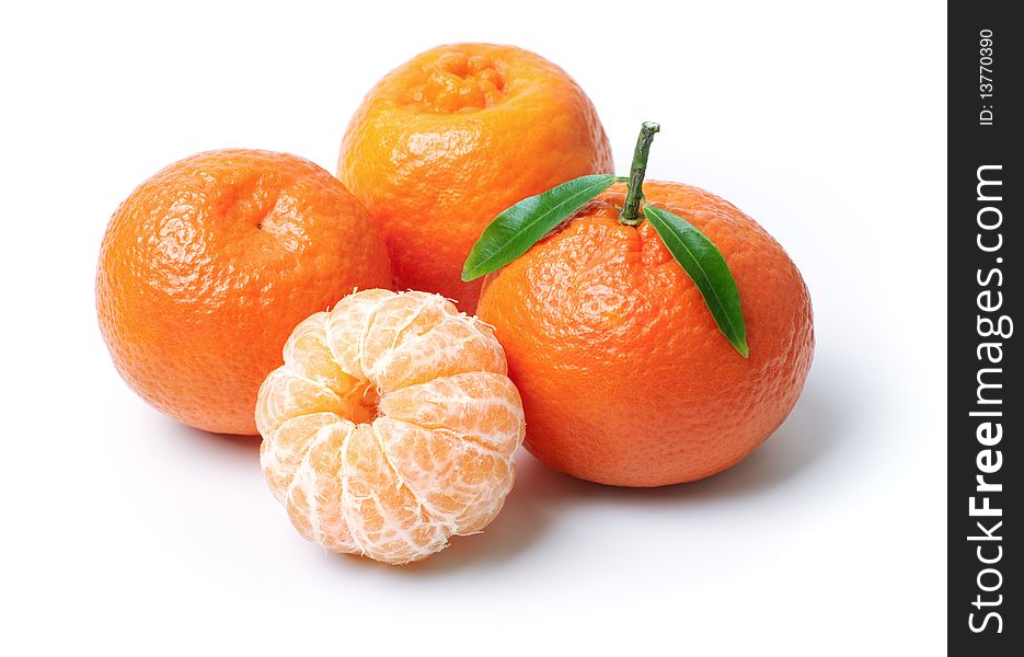 Four tangerines isolated on white background