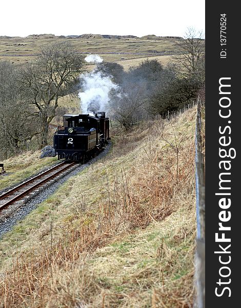 A steam train in the day