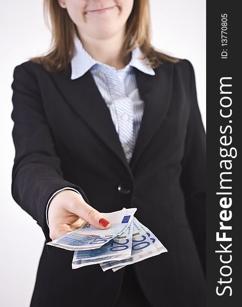 Young businesswoman holding euro notes