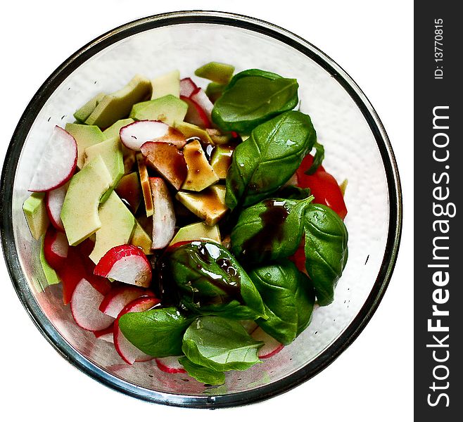 Vegetables salad in the glass bowl on  white background. Vegetables salad in the glass bowl on  white background