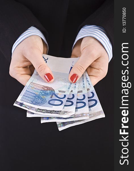 Young businesswoman holding euro notes