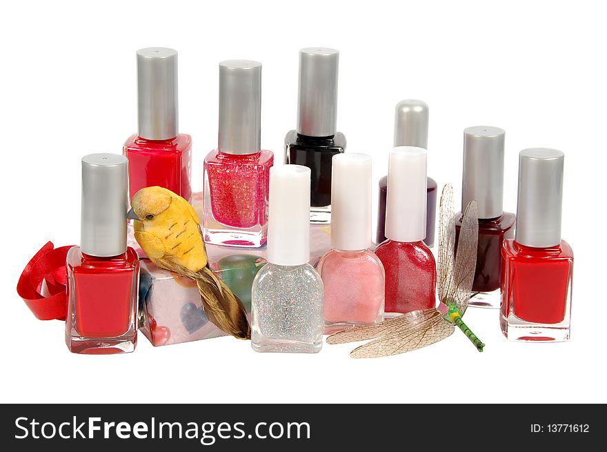 Some nail polishes on a white background