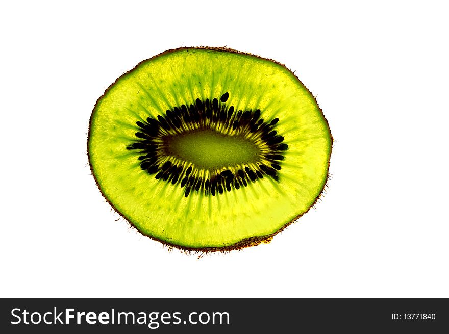 Close up of kiwi fruit slice on white background