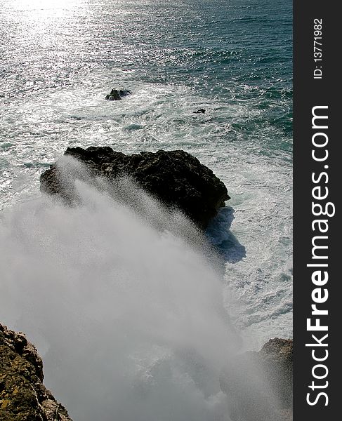 Big wave splash against the coast rocks