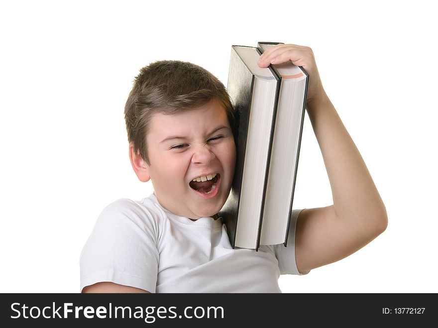 Happy boy holds some books and smiles