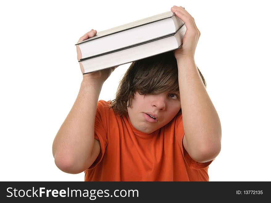 Scared teenager holds some books over head isolated in white