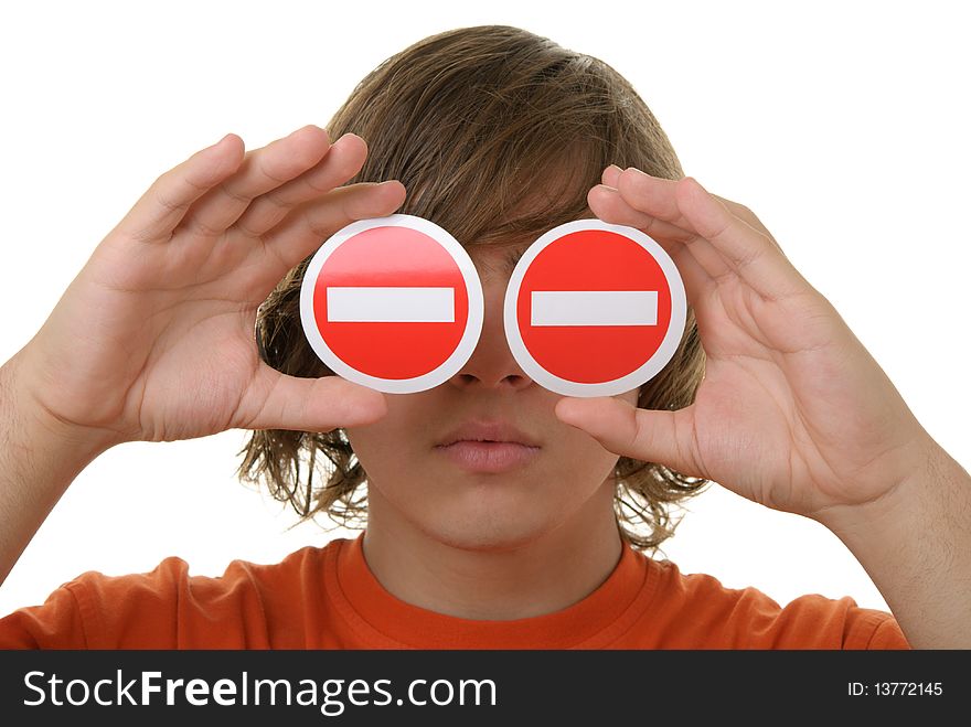 Teenager holds prohibiting signs before eyes isolated in white